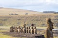 A moai and the moais of Ahu Tongariki on the background. South coast of Easter Island, Chile