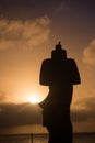 Moai shilouette during the sunset in Easter Island, Chile