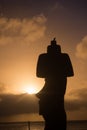 Moai shilouette during the sunset in Easter Island
