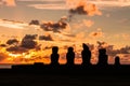 Moais backligth in an Easter Island sunset Royalty Free Stock Photo