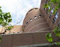 Moakley Courthouse framed by trees leafing out along Courthouse