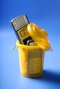 Mobil cell phone on the trash Royalty Free Stock Photo