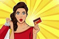 Pop art young woman holding shopping bags and credit card Royalty Free Stock Photo