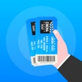 Hand holding two tickets. Cinema tickets. Vector illustration. Royalty Free Stock Photo