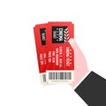Hand holding two tickets. Cinema tickets. Vector illustration. Royalty Free Stock Photo