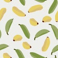 Seamless pattern of yellow and green bananas randomly distributed on light background.