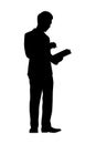 Standing man with book silhouette vector Royalty Free Stock Photo