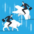 Businessmen ride on bull and bear in stock market trading concept Royalty Free Stock Photo