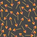 Seamless vector pattern with burning matches on dark background.