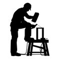 Construction worker with welding machine silhouette vector Royalty Free Stock Photo