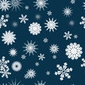 White snowflakes on a dark blue background. Christmas. An endless pattern. For wrapping paper.