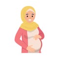 Happy pregnant Muslim woman holding her belly