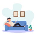 Man lying on sofa watching TV at home