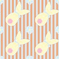 Children`s Easter seamless pattern, an egg with a bow and ears, a gift rabbit, chamomile flowers, stripes Royalty Free Stock Photo