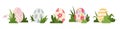 Set cute Easter eggs decorated with pastel patterns and spring flowers, arranged with green grass. Royalty Free Stock Photo
