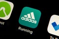 Mobile Adidas Running app icon isolated on black iPhone screen.