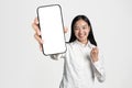 Mobile Advertisement. Woman Showing Big Blank Screen Smartphone At Camera