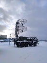 mobile air defense truck with radar antenna. Satellite dishes or radio antennas sky. Royalty Free Stock Photo