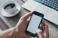 Mobile app, closeup of hands holding smartphone with empty screen