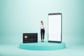 Mobile bank and banking concept with pensive woman among modern smartphone with blank white screen with space for web design or
