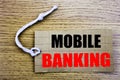 Mobile Banking. Business concept for online saleInternet Banking e-bank written on price tag paper with copy space on the wooden v Royalty Free Stock Photo
