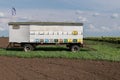 Mobile Beehive by Sunflowers Field