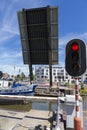 Mobile bridge rise up so that a cargo ship can pass Royalty Free Stock Photo