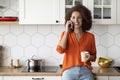 Mobile Call. Happy Black Millennial Woman Talking On Cellphone In Kitchen Royalty Free Stock Photo