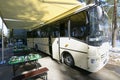 Mobile canteen for soldiers, accommodated in a bus: tables served with cutlery. Staroe, Ukraine