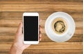 Mobile and coffee cup Royalty Free Stock Photo