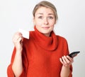 Mobile commerce for surprised young woman paying online Royalty Free Stock Photo