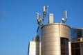 Mobile communication antennas on the building.