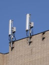 Mobile communication antennas on the wall of a building