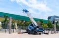 Mobile crain waitting lift up cement bucket pour pole