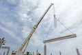 Mobile crane is carry concrete joist to assembly huge hall