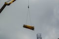 Mobile crane  lifting material at construction site Royalty Free Stock Photo