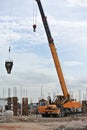 Mobile crane used to lifting heavy material at construction site Royalty Free Stock Photo