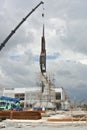 Mobile crane used to lifting heavy material at construction site