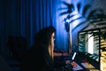 Mobile developers team writes program code on a computer, programmers work in home office