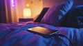 Mobile device charging on bed with dimmed lighting Royalty Free Stock Photo