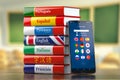 Mobile dictionary, translator and e-learning.concept . Learning languages online. Smartphone and books with language courses