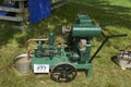A mobile English made lister Steam Engine being demonstrated at the Strathmore Vintage Vehicle Show.