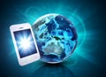 Mobile in front of earth on abstract background Royalty Free Stock Photo