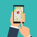 Mobile gps navigation on mobile phone. Hand holds smartphone with city map on screen. Vector illustration flat design Royalty Free Stock Photo