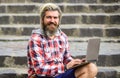 Mobile internet. Agile business. Bearded guy sit stairs background. Work and relax. Working online. Hipster inspired Royalty Free Stock Photo