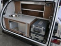 Mobile kitchen in trunk of light modern turkish trailer camper van Caretta 1500