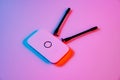 mobile modem in multicolored lighting. device has SIM card supported by 4G Royalty Free Stock Photo