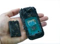 Mobile phone battery explodes and burns due to overheat danger of using smart phone.