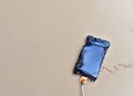 Mobile phone caught fire from the wire with recharging from the electrical network in the socket. Inexpensive chargers put your