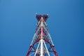 Mobile phone cellular telecommunication radio antenna tower. Cell phone tower against blue sky Royalty Free Stock Photo